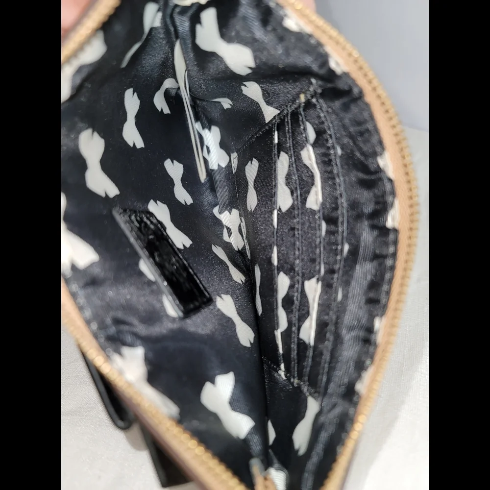 Kate spade New York Creamy Caramel Brown Wristlet.